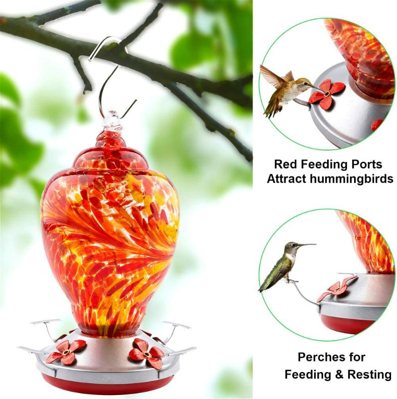 Photo 2 of WOSIBO Hummingbird Feeder for Outdoors Patio Large 32 Ounces Colorful Hand Blown Glass Hummingbird Feeder with Ant Moat Hanging Hook, Rope, Brush and Service Card (RED) NEW