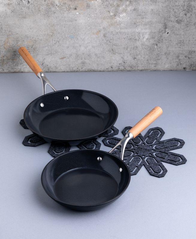 Photo 1 of Brooklyn Steel Co. 4-pc. Atmosphere Nonstick Cookware Set, Black
Set includes:
8" fry pan, approx. dimensions: 15"L x 8"W x 2.7"H
10" fry pan, approx. dimensions: 17.6"L x 10"W x 2.8"H
Two felt cookware protectors (small and medium)
Aluminum forged vessel