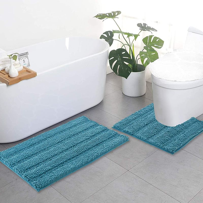 Photo 1 of NICETOWN Bathroom Rugs Slip-Resistant Absorbent Soft and Fluffy Thick Striped Bath Mats Non Slip Microfiber Shag Floor Mats Dry Fast Waterproof Bath Mats (Teal Blue, Set of 2-20" x 32"/24" x 24" U)