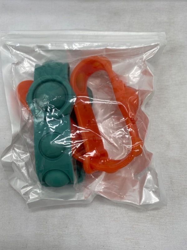 Photo 2 of Simple Fidget Toy 2 Pcs (Orange/Green), Portable Simple Sensory Fidget Bracelet, Stress Relief Hand Toy for Kids Adults Anxiety Autism, Wearable Stress Reliever Sensory... NEW 