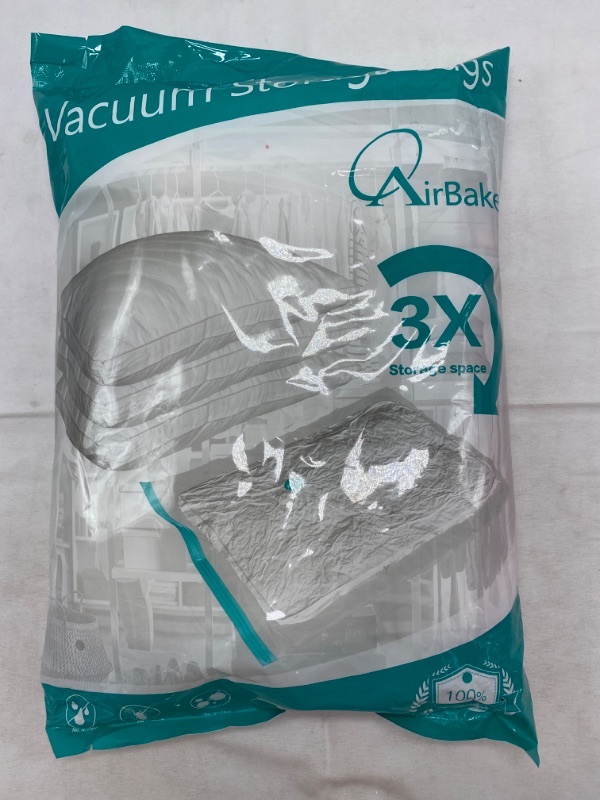 Photo 4 of Vacuum Storage Bags - 4 Pack (4 Large + Vacuum Seal Bags for Clothing - Vacuum Sealed Storage Clothes Comforters Blanket - Space Save for Suitcase Closet Vacuum Seal Storage Bags NEW 