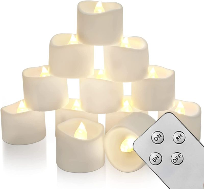 Photo 1 of Homemory Flameless Candles with Remote and Timer, Battery Operated Candles Tea Lights Candles, Flickering Flameless Candles for Home Decor Room Decor, 12Pcs NEW 