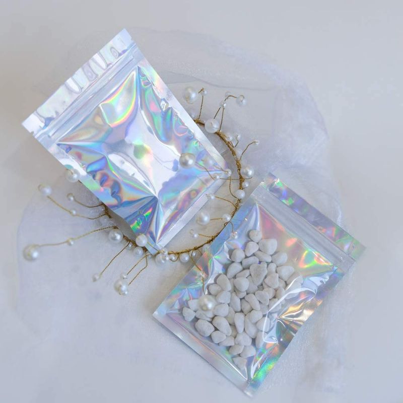 Photo 2 of 100 Pieces Mylar Holographic Resealable Bags - Smell Proof Bags, Foil Pouch Ziplock Bags for Party Favor Food Storage (Holographic Color) NEW 