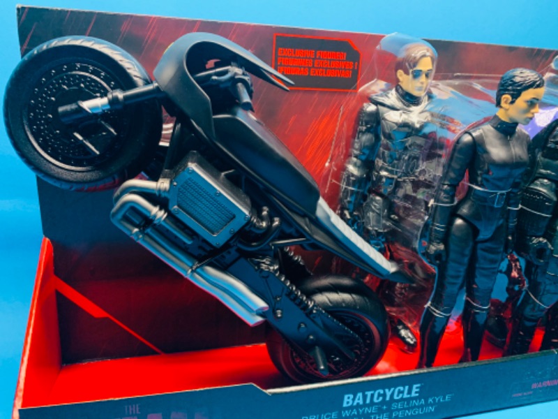 Photo 2 of 825558…the Batman batcycle and four 12” action figures  