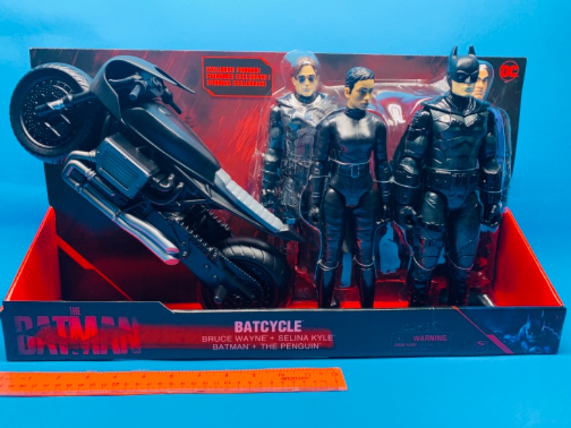 Photo 1 of 825559… the Batman batcycle and four 12” action figures  