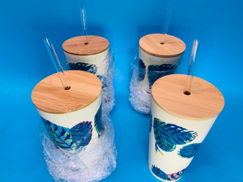 Photo 1 of 826255… 4 stainless steel tumblers with bamboo lids and straws 