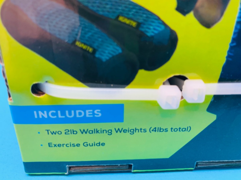 Photo 2 of 826895…  4 ignite two pound walking weights- 8 pounds total with hidden storage pockets