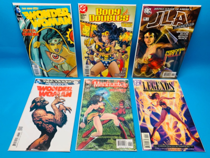 Photo 1 of 827033…6 wonder woman Comics in plastic sleeves