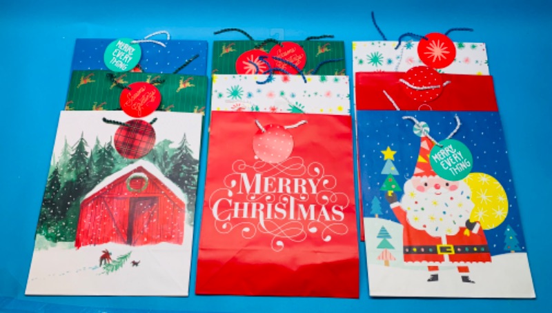 Photo 1 of 827341…9 large Christmas gift bags