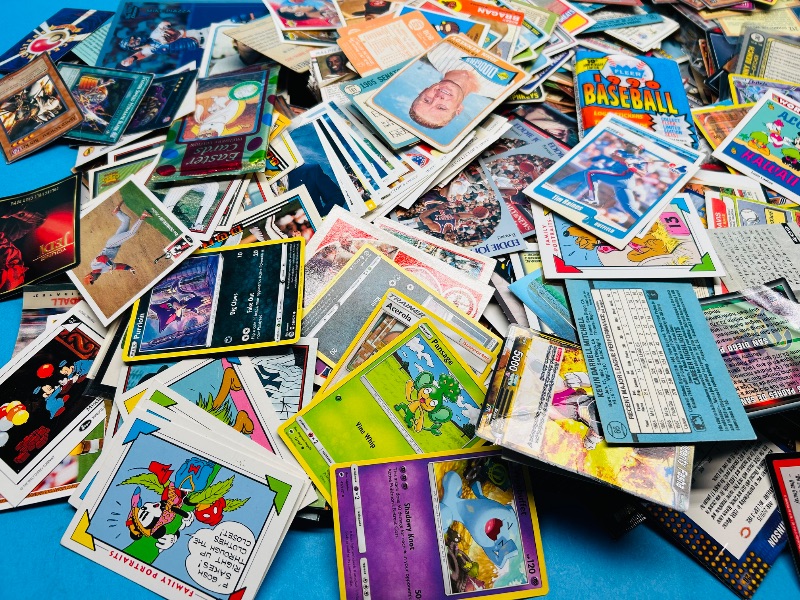 Photo 1 of 827404…damaged-final sale no returns /refunds- hundreds of sports  and game cards all with minor-major bends, rips, folds, stains
