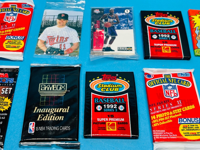 Photo 1 of 827482…. final sale no returns/refunds--10 sealed sports card packs