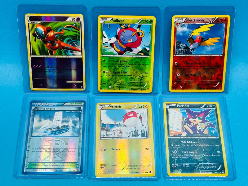 Photo 1 of 827496…6 Pokémon reverse holo cards in hard plastic sleeves 