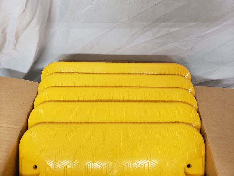 Photo 2 of high impact plastic speed bumps 5 pieces in each box (all in inches 17.5 L 7.75w 1.5H)