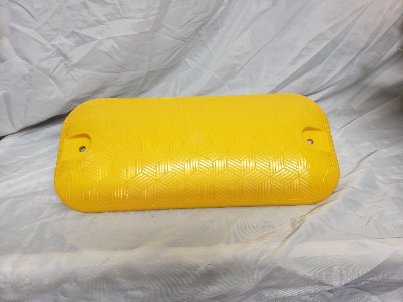 Photo 1 of high impact plastic speed bumps 5 pieces in each box (all in inches 17.5 L 7.75w 1.5H)