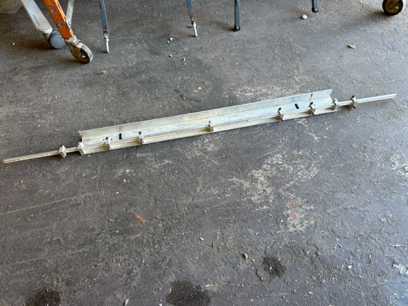 Photo 1 of unknown measuring device 72 inches long 