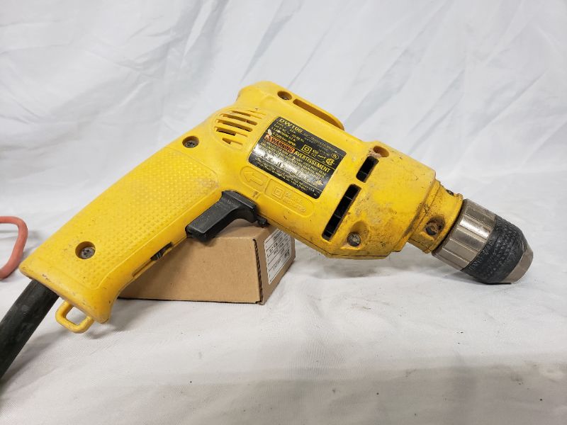 Photo 1 of Dewalt corded drill 3/8" 