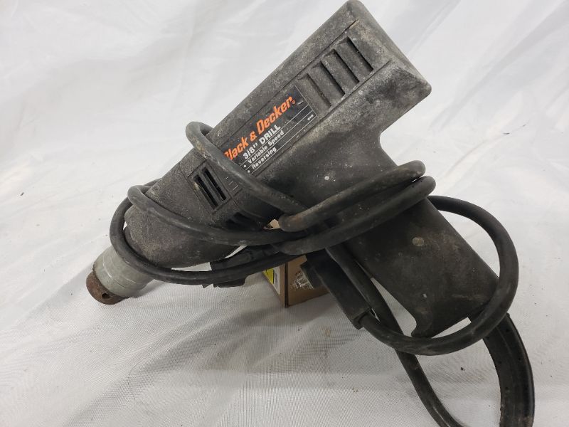 Photo 1 of Black & decker 3/8" drill