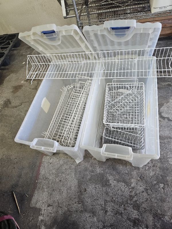 Photo 1 of 2 plastic bins with metal bins inside 