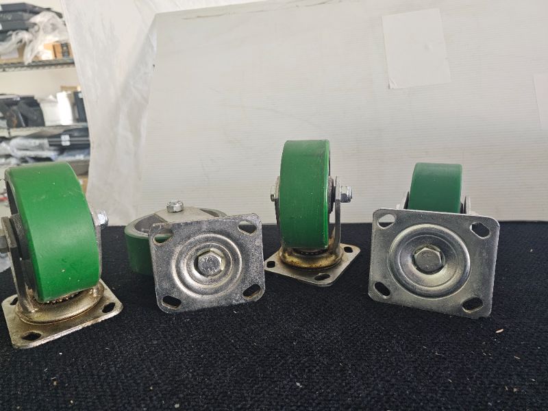 Photo 2 of set of 4 5" poly swivel casters 5 x2 dirty but look unused 