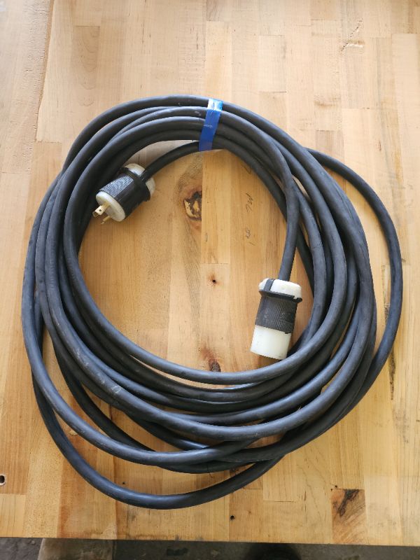 Photo 1 of Heavy duty appx 25 foot extension cord with twist lock 