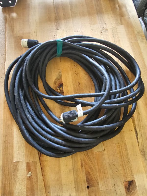 Photo 1 of Heavy duty extension cord edison ends 12/3 appx 50 feet 