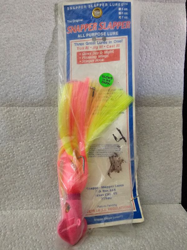 Photo 1 of 7oz Snapper Slapper Saltwater Lure
7oz Weighted Squid Head
Colorful Skirt
Rigged with Single Assist Hook Through the Eyelet
Realistic Fish Eye Design
Catches All Blue Water Fish