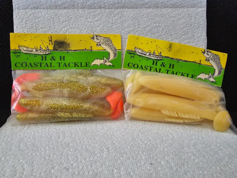 Photo 1 of H&H Coastal Tackle / H&H Lure Co. 
5 in bag: Yellow with Orange Tail - Glitter
5 in bag: Nude 
Made in the USA
*See photos for details