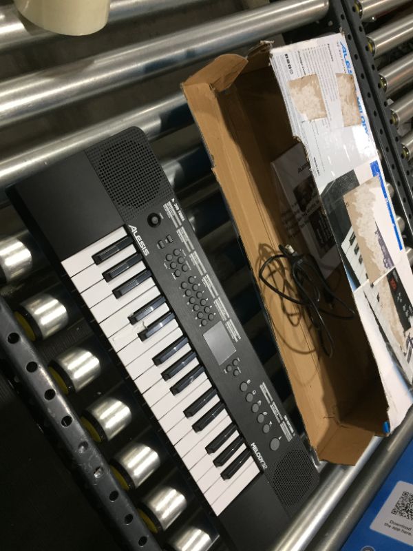 Photo 2 of Alesis Melody 32 – Electric Keyboard Digital Piano with 32 Keys, Speakers, 300 Sounds, 300 Rhythms, 40 Songs, USB-MIDI Connectivity and Piano Lessons
