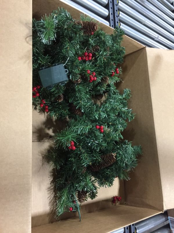 Photo 1 of Artificial Christmas Garland, Green, Crestwood Spruce, White Lights, Decorated with Pine Cones, Berry Clusters,