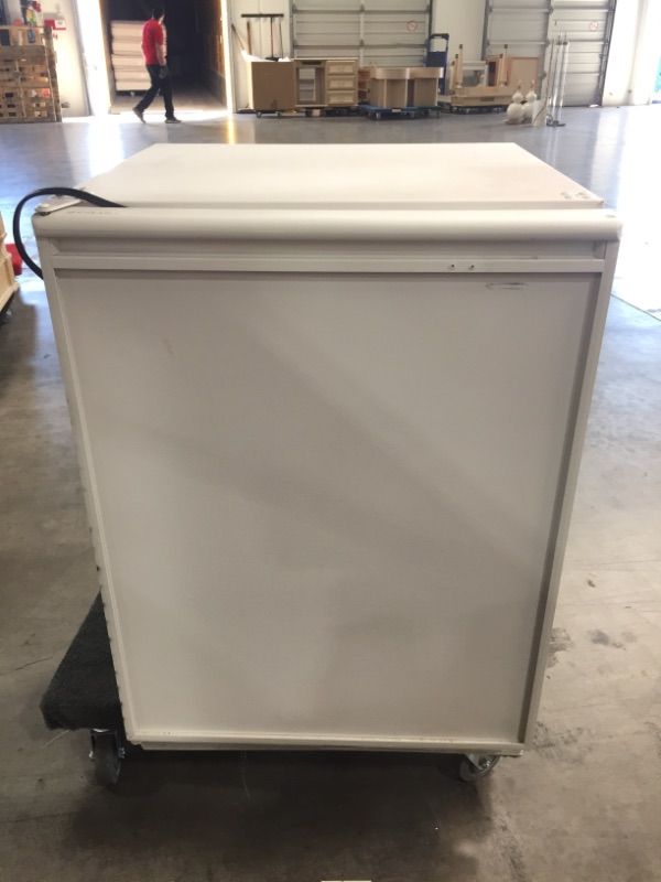 Photo 1 of ULINE SMALL PERSONAL REFRIGERATOR 73FL COLUME DAMAGE AND WEAR FROM USE 23 L X 24 W X 34 H