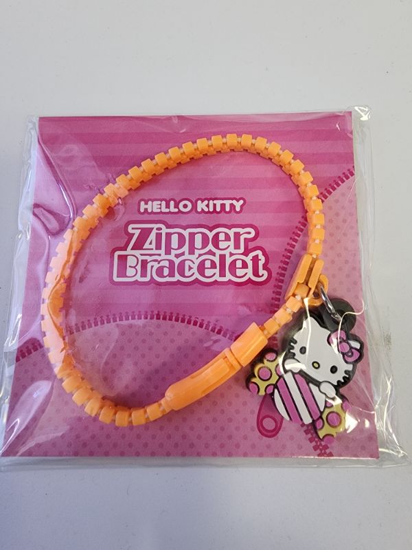 Photo 1 of HELLO KITTY ZIPPER BRACELET W/CHARM ORANGE