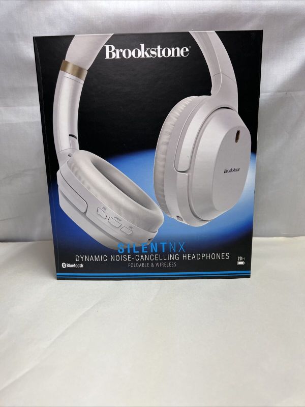 Photo 2 of Brookstone Silent NX Dynamic Noise Cancelling Headphones Blue Tooth Cordless. With the latest active noise-cancelling technology, you can tune everything out and listen peacefully to your favorite songs Listen to every beat, vocal line, and solo in rich, 