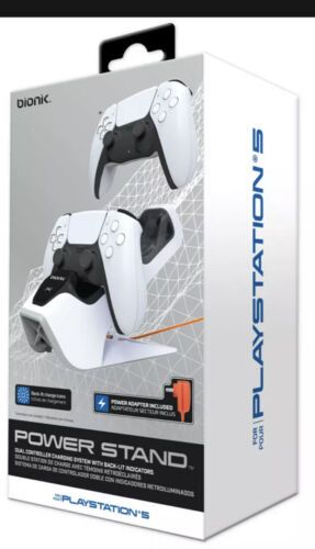Photo 1 of Power Stand For Ps5 Dual Controller Charging System [white] (DreamGear). **(CONTROLLERS SOLD SEPARATELY) ** The bionik Power Stand for PlayStation 5 features dual charge and a display dock for up to 2 DualSense wireless controllers. Compact design for min