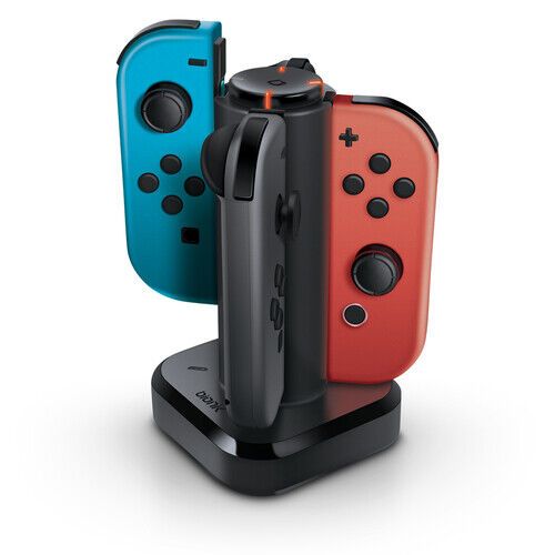 Photo 1 of BIONIK BNK-9019 TETRA POWER Nintendo Switch Quad Port Dock For Controllers Black. With this charge dock, you'll never have to worry about waiting for your controllers to charge again. (CONTROLLERS SOLD SEPARATELY)