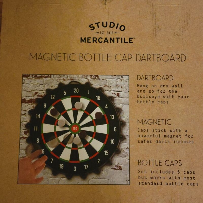 Photo 2 of Studio Mercantile Game Magnetic Bottle Cap Dartboard.12" L; 1.85"W; 12"H; perfect for any game room or dorm. Play anywhere by simply hanging on the wall or using the included stand; Make up your own rules for endless amounts of fun; 12" convenient size. A