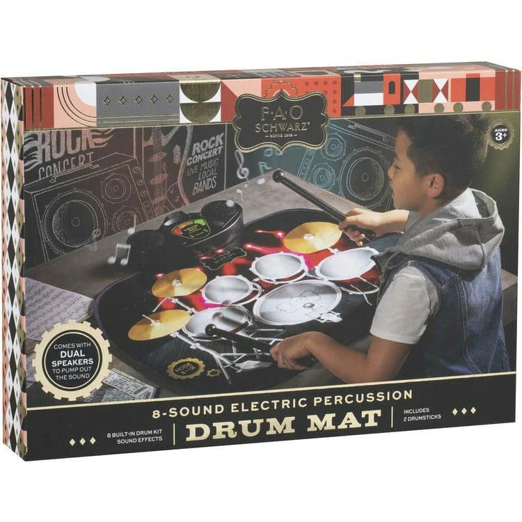 Photo 1 of FAO Schwarz Toy Tabletop Drum Mat, Created for Macy's. Featuring a cordless mat, dual speakers, and two drumsticks, this tabletop drum set has a touch-sensitive pad that produces eight different sounds. Each instrument is illustrated on the pad and produc