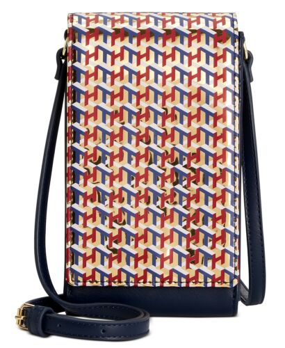 Photo 1 of Tommy Hilfiger Rita Phone Crossbody This woven crossbody is essential for any collection. Mini sized bag; 7-2/3"W x 5-1/2"H x 1-1/2"D 
Silhouette is based off 5'9" model. 23-5/8"L adjustable strap. Turnlock closure. Gold-tone exterior hardware. 4 interior