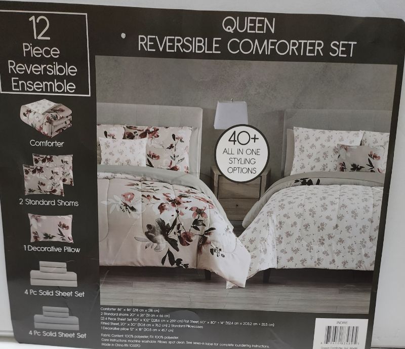 Photo 2 of QUEEN SIZE  Indre 12-Pc. Reversible Comforter & Sheet Bedding Set FLORA
Includes Reversible comforter, 2 reversible standard shams, 1 decorative pillow, 2 sets of 4 piece solid sheet set .(see pictures)