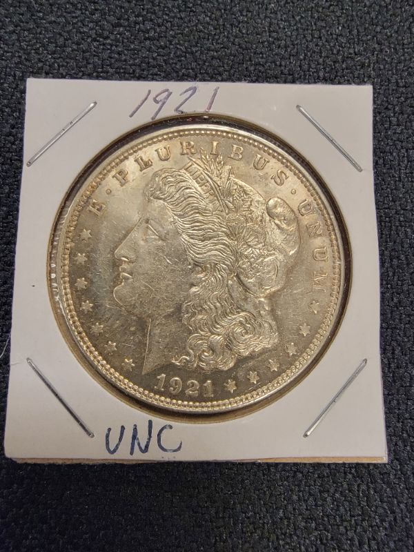 Photo 1 of 1921 Morgan Dollar Uncirculated