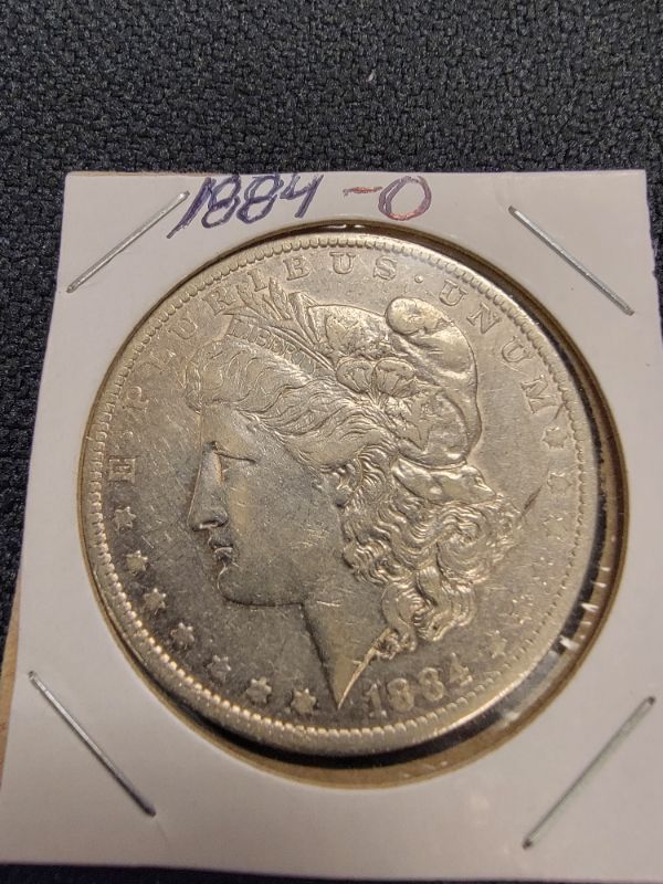 Photo 1 of 1884 O Morgan Dollar