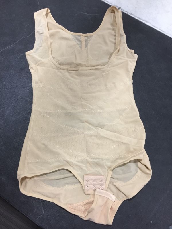 Photo 1 of womens nude body suit size xl