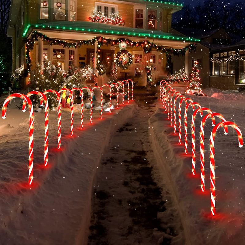 Photo 1 of 24 Pack small Candy Cane Lights,  Christmas Candy Cane Pathway Markers Lights, 2 Set of 12 Pack Indoor/Outdoor Christmas Decorations Lights