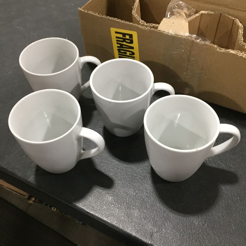 Photo 1 of AmazonCommercial 4-Piece Porcelain, 12 Oz. Coffee Mug Set, White