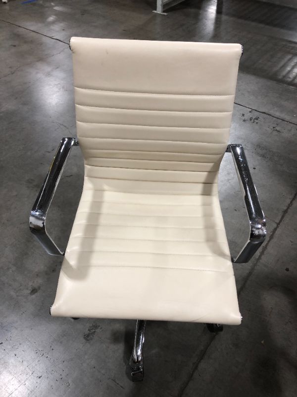 Photo 1 of CREME FAUX LEATHER OFFICE CHAIR WITH ARMREST 36H X 20W INCHES