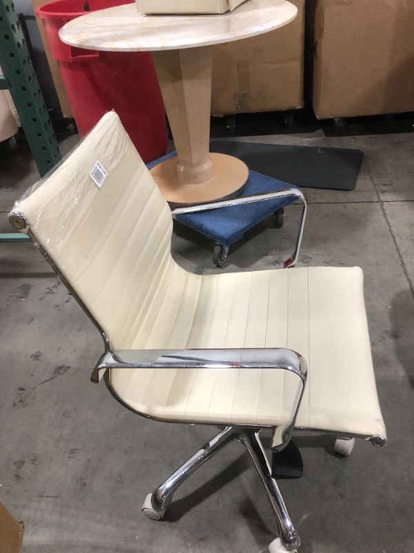 Photo 1 of CREME FAUX LEATHER OFFICE CHAIR WITH ARM REST 36H X 20W INCHES