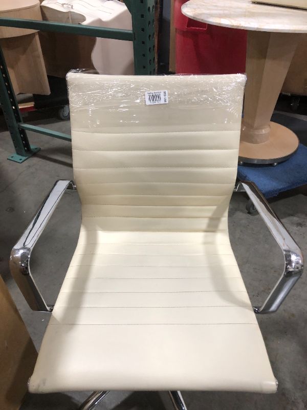 Photo 1 of CREME FAUX LEATHER OFFICE CHAIR WITH ARM REST 36H X 20W INCHES