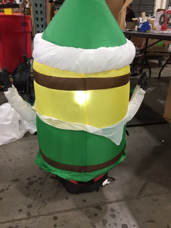 Photo 3 of Gemmy 4Ft. Tall Christmas Inflatable Airblown Minion Dave in Green Elf Suit with Star On His Cap Indoor/Outdoor Holiday Decoration
