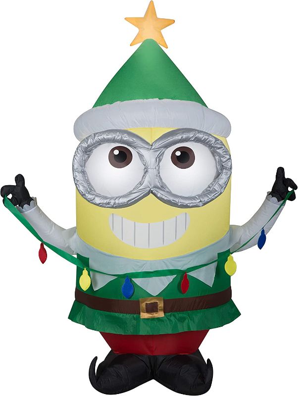 Photo 1 of Gemmy 4Ft. Tall Christmas Inflatable Airblown Minion Dave in Green Elf Suit with Star On His Cap Indoor/Outdoor Holiday Decoration
