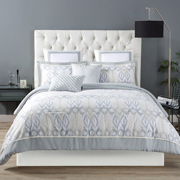 Photo 1 of SIZE KING - Christian Siriano Java Duvet 3 Piece Set - Grey/White. This three-piece duvet cover set's ikat pattern is paired with a modern geometric diamond pattern in white sand and smoked pearl tones, creating a relaxing island oasis. Such neutral color