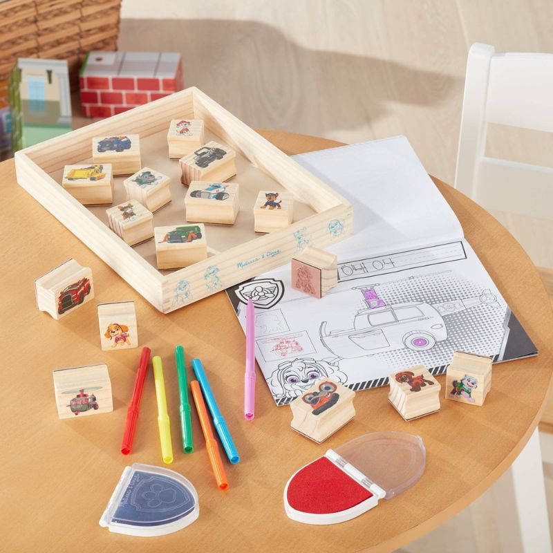 Photo 1 of Melissa & Doug PAW Patrol Wooden Stamps Activity Set with Markers Activity Pad (25 Pieces) - The PAW Patrol pups are ready to go go go wherever imagination leads! Mix and match wooden-handled pup and vehicle stamps and color with markers to create countle